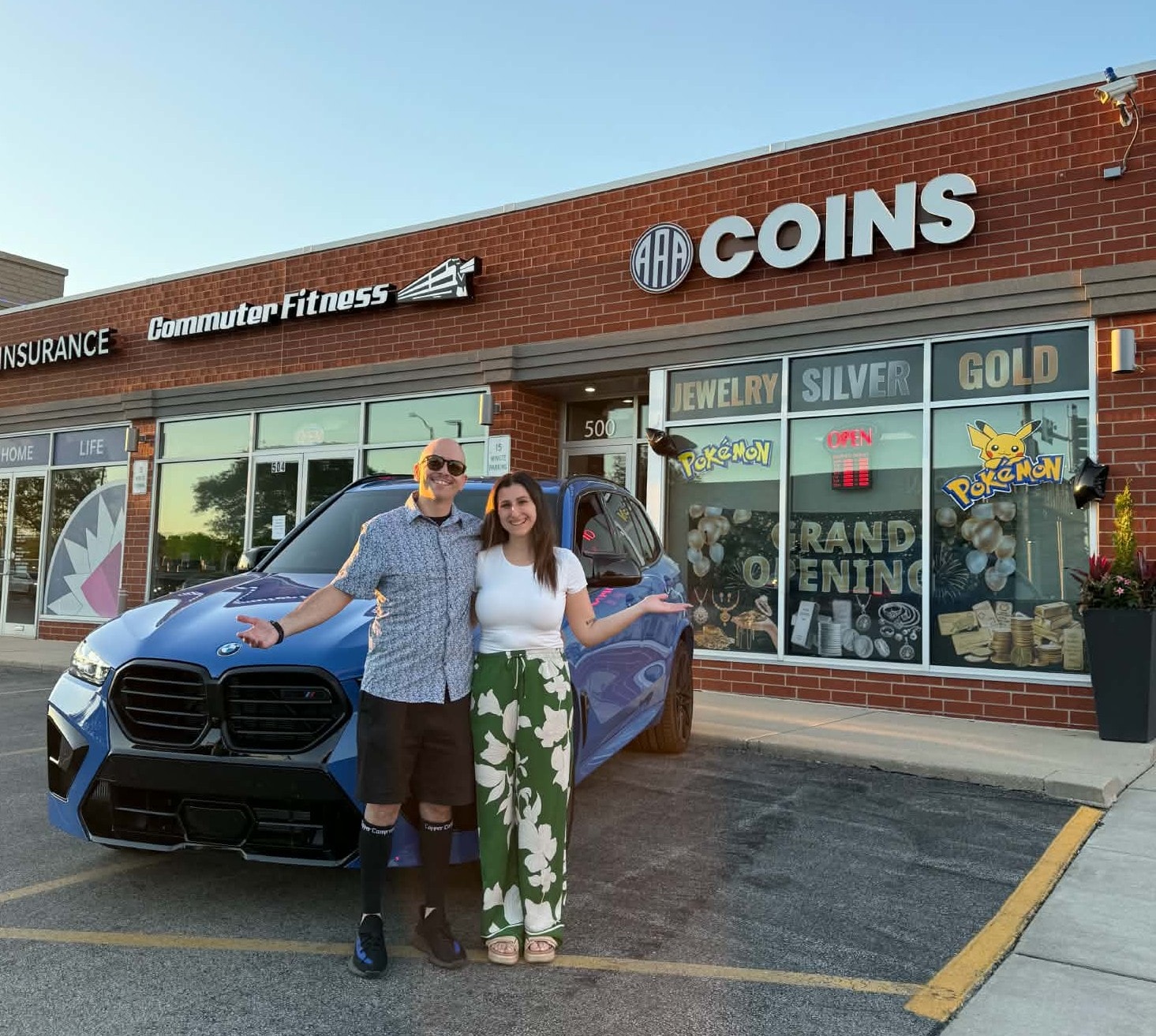 The owners of AAA Coins & Collectibles at their grand opening in Arlington Heights